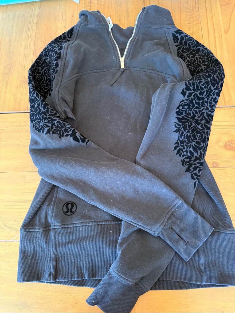 lululemon athletica Black Half-Zip Pullover with Teal-Zip Accent